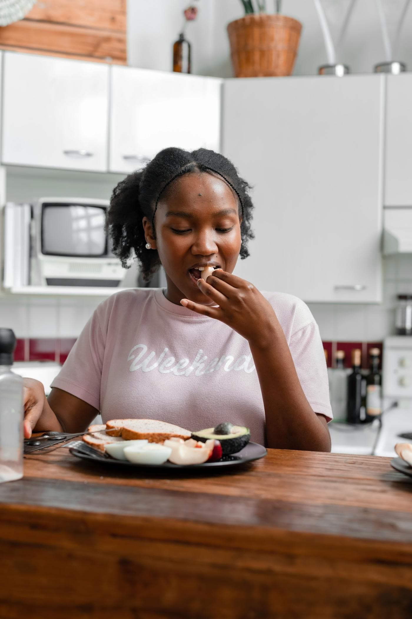 African woman enjoying a healthy breakfast